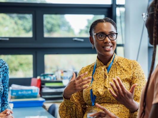 teacher talking to other teachers