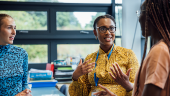 teacher talking to other teachers